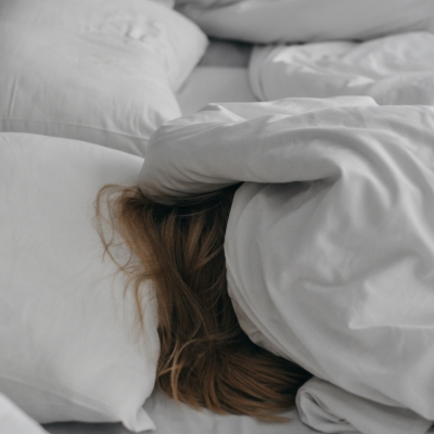 Woman under the covers